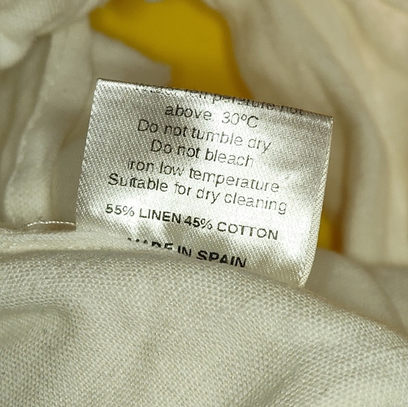 Elegant White Asymmetrical Crop Top - Picture 7 of 7